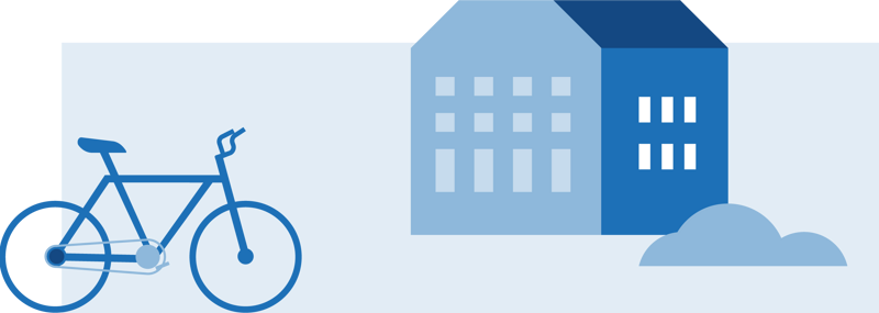 Et blått hus og en sykkel foran det.