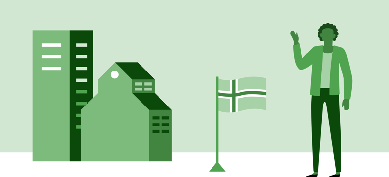 En mann som står foran en høy bygning.